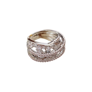 Minimalist multi-layer crisscross silver ring with shimmering pavé zircon stones