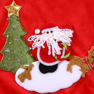 Christmas stocking fabric featuring Santa, reindeer and tree embroidery on red felt
