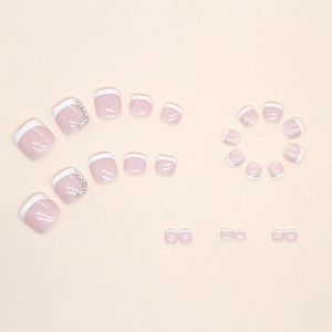 Classic white French press-on toe nails with rhinestones and pink translucent base