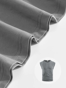 Detail view of double-stitched hem and premium knit texture on gray sleeveless tank top