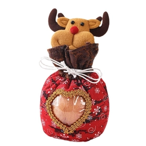 Christmas reindeer candy bag in red fabric with heart-shaped window for apple gifts