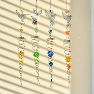 Set of four colorful metal hummingbird spiral crystal suncatchers for garden window decor