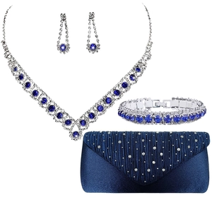 Silver bridal jewelry set with blue zircons, necklace, earrings and navy satin clutch bag