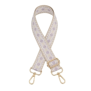 Detail of adjustable bag strap featuring beige and lavender diamond woven patterns with gold clasps