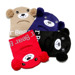 Flat lay of knit bear balaclava hats in four colors with pom-poms and soft ear details