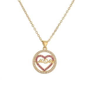 Elegant gold plated MOM necklace with heart pendant and pink crystal in studio lighting