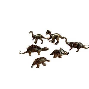 Set of 6 vintage bronze miniature dinosaur figurines with detailed scales for home decor