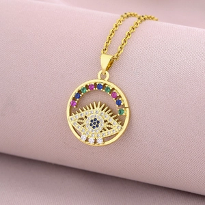 Detailed macro view of 18K gold plated evil eye pendant with colorful zircon crystals