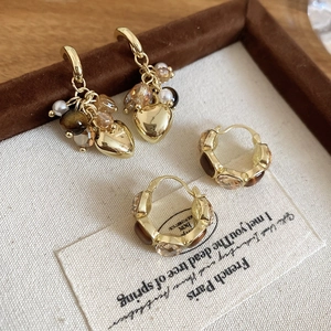 Tiger eye heart fringe earrings and square crystal hoops in a vintage gold finish