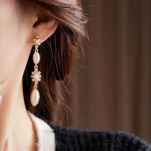 Vintage gold-plated dangle earrings with marquise stones and zircon accents for women