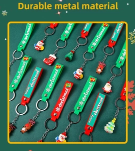 Detailed close-up of Santa Claus and Reindeer soft rubber Christmas keychains