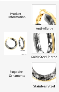 Detail view of 6.1x41.5mm gold plated stainless steel marble resin hoop earrings
