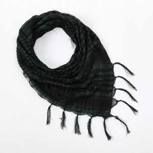 Detailed view of black and green shemagh tactical scarf with woven check pattern and fringes