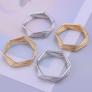 Minimalist hexagonal multilayer stainless steel rings in gold and silver finish
