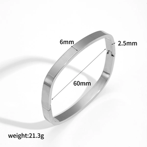 Detailed view of silver steel cuff with 6mm width and 60mm diameter measurements