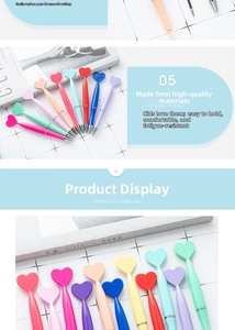Detailed view of colorful heart-shaped plastic ballpoint pens in macaron pastel colors