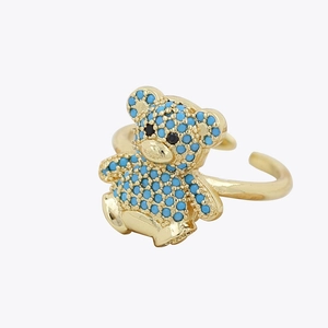 Golden teddy bear open ring for women with vibrant blue and black micro-set cubic zirconia