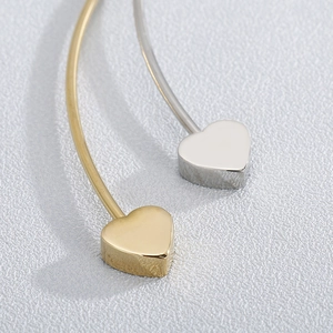 Modern gold and silver heart-shaped cuff earrings set made of polished stainless steel