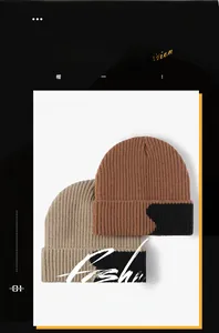 Detailed knit texture of color-block beanies with thick vertical stripe weaving pattern