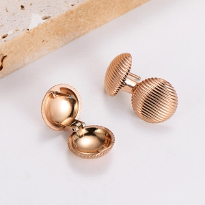 Rose gold stainless steel textured round clip-on earrings with hinged opening mechanism