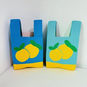 Knitted tote bag with lemon pattern in blue and light blue chunky wool crochet style
