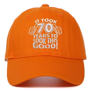 Detail of 70th birthday orange cotton baseball cap with white 3D text embroidery