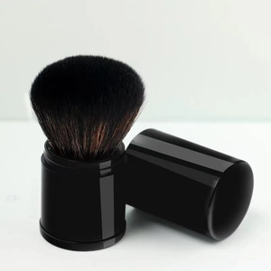 Portable retractable large powder brush with black lid and soft dual-tone bristles