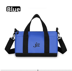 Close-up of blue nylon crossbody bag featuring black handles and a JLP logo print