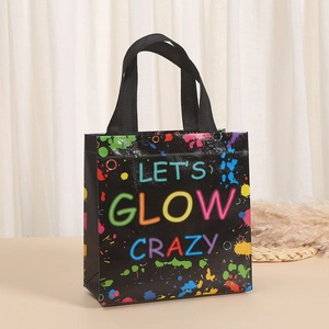 Detail of Let's Glow Crazy print on black non-woven gift bag with colorful splash patterns