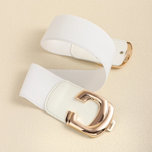 Detailed macro view of white elastic waist belt with luxury golden C-shaped metal buckle
