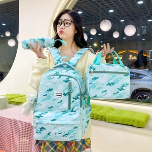 Three-piece school backpack set with light blue camouflage pattern for students