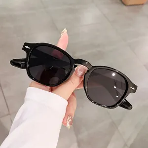 Classic square black sunglasses with dark lenses and minimalist resin frame for men