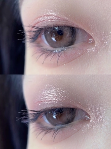 Macro detail of brown contact lens with shimmering pink eyeshadow makeup look