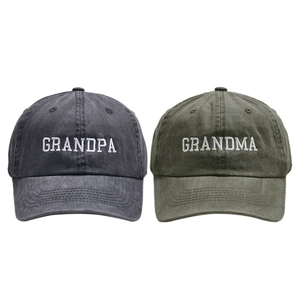 Detail of washed cotton baseball caps with Grandpa and Grandma white embroidery