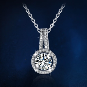 Close-up of 2 carat round moissanite pendant with sparkling halo on O-chain necklace