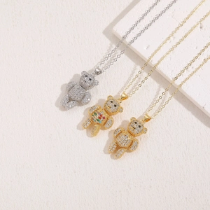 Luxurious 14K gold plated teddy bear pendants with zircon pavé on a fine chain necklace