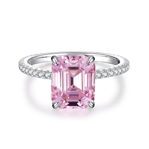 Luxurious S925 sterling silver ring with large emerald-cut pink zircon and pavé side stones