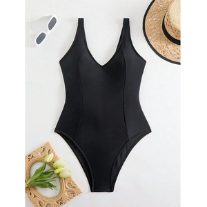 Flat lay of elegant black one-piece swimsuit with V-neck and slimming side straps