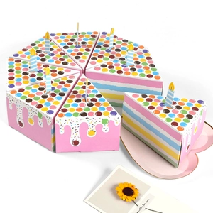 Pink triangle cake slice gift boxes with rainbow stripes and candle toppers on white background