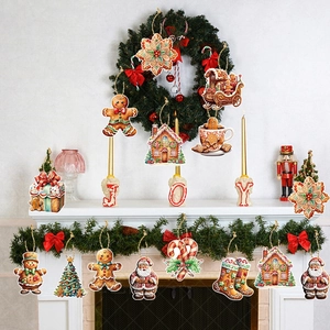 Gingerbread man and Santa Christmas hanging ornaments set for cozy fireplace decoration