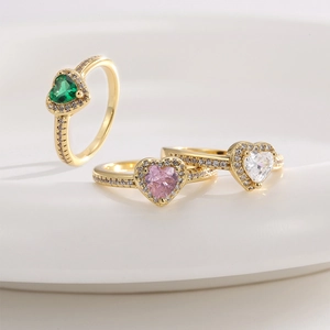 Elegant heart-shaped pink and green zircon rings with gold plating and paved accents