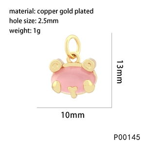 Detailed macro shot of 13mm pink bear charm in gold-plated copper for jewelry making