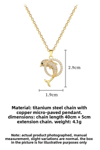 Detailed view of dolphin pendant with white zircons and dimensions on gold titanium chain