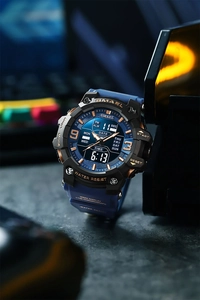 Close-up of dual display sport watch with blue rubber strap and rose gold detailing