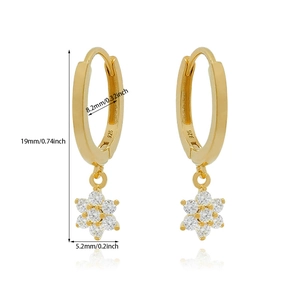 Detail view of 24K gold plated earrings with zircon flower pendant and 925 silver hallmark