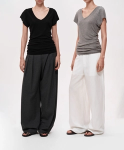Dual-model view of minimalist V-neck T-shirt and high-waisted trousers in gray and black