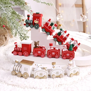 Handcrafted wooden Christmas train ornament with festive red and green decorative elements