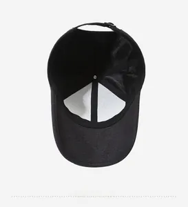 Internal detail of black casual baseball cap featuring adjustable buckle and reinforced seams