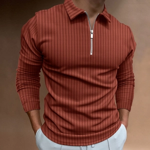 Detail of rust red men's polo shirt with zip neck and vertical knit texture