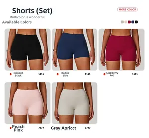 Dettaglio degli shorts da yoga a vita alta in cinque colori tra cui nero, blu e rosa